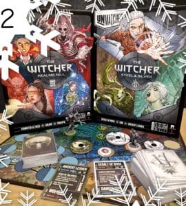 Image of two board games titled "The Witcher: Realms Fall" and "The Witcher: Steel & Silver," featuring colorful artwork of characters and monsters from the Witcher universe. The image showcases game pieces, cards, and a game board, set against a festive background with snowflakes.