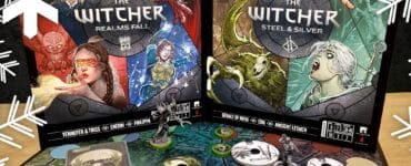 Image of two board games titled "The Witcher: Realms Fall" and "The Witcher: Steel & Silver," featuring colorful artwork of characters and monsters from the Witcher universe. The image showcases game pieces, cards, and a game board, set against a festive background with snowflakes.