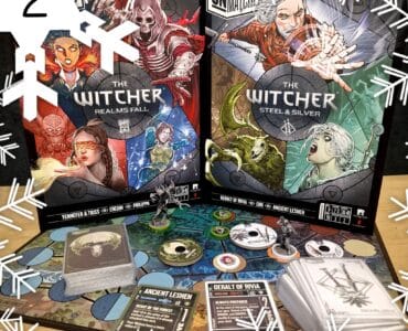 Image of two board games titled "The Witcher: Realms Fall" and "The Witcher: Steel & Silver," featuring colorful artwork of characters and monsters from the Witcher universe. The image showcases game pieces, cards, and a game board, set against a festive background with snowflakes.