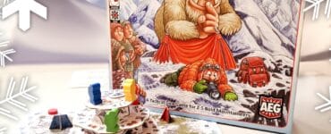 Board game "Yeti" by Benjamin Schwer displayed with colorful game pieces on a snowy mountain landscape, featuring a whimsical Yeti illustration on the box cover, suitable for 2-5 players.