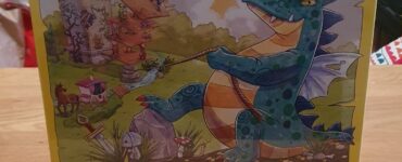 Drachen Turm board game box featuring colorful artwork of a dragon and a whimsical castle, designed by Carlo A. Rossi, published by HABA. Ideal for cooperative play and memory skills development.