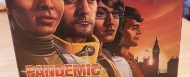 Box cover of the board game "Pandemic: Hot Zone - Europe" featuring characters and elements related to a cooperative gameplay experience. Designed by Matt Leacock and Tom Lehmann, this game emphasizes teamwork in a race against time to combat disease outbreaks in European cities.