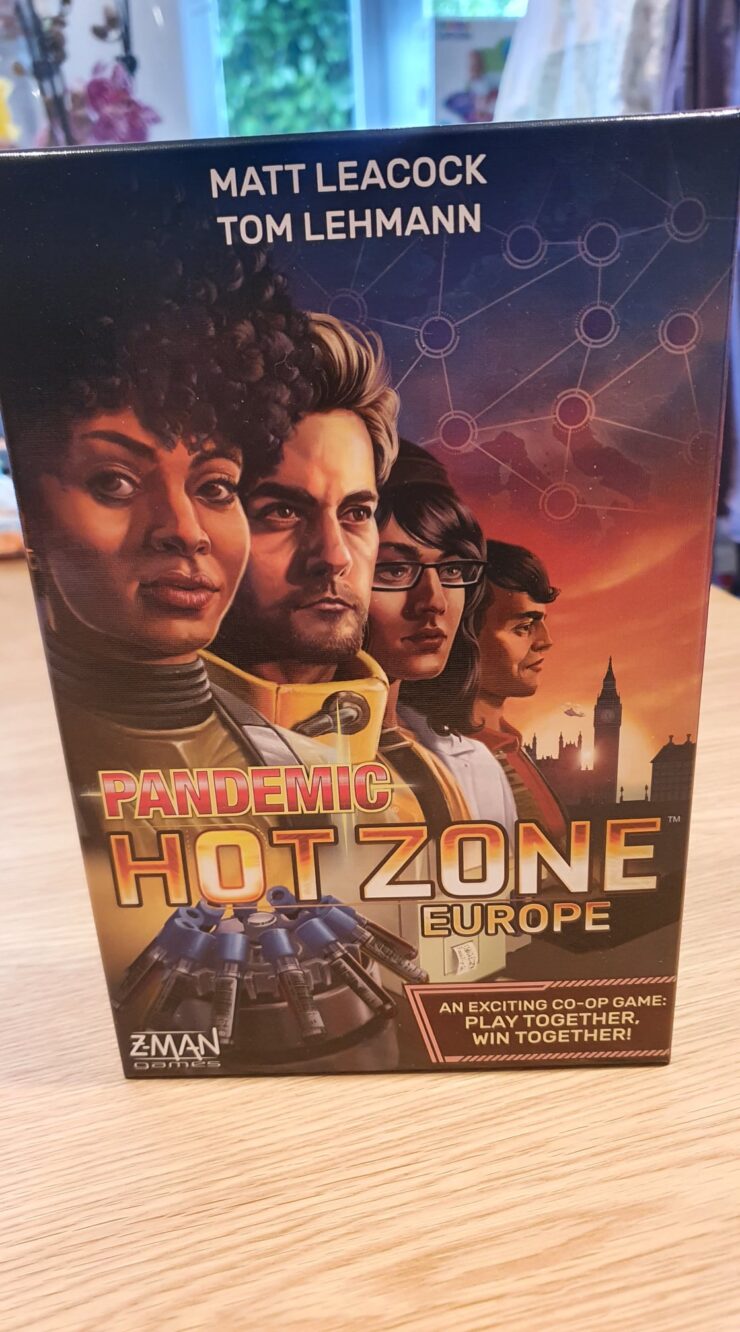 Box cover of the board game "Pandemic: Hot Zone - Europe" featuring characters and elements related to a cooperative gameplay experience. Designed by Matt Leacock and Tom Lehmann, this game emphasizes teamwork in a race against time to combat disease outbreaks in European cities.