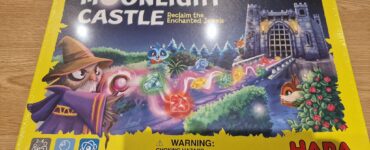 Colorful board game box for "Moonlight Castle" by HABA, featuring a whimsical wizard, enchanted jewels, and a castle backdrop. Designed for 2-4 players aged 5 and up, this game invites players to reclaim magical gems in a charming fantasy setting.
