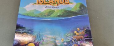 Colorful board game box for "Coral Islands," featuring vibrant underwater scenes with fish and coral. Designed by Richard Maass and Rohan Dargad, suitable for ages 8 and up, for 1-4 players, with a playtime of 15-45 minutes.