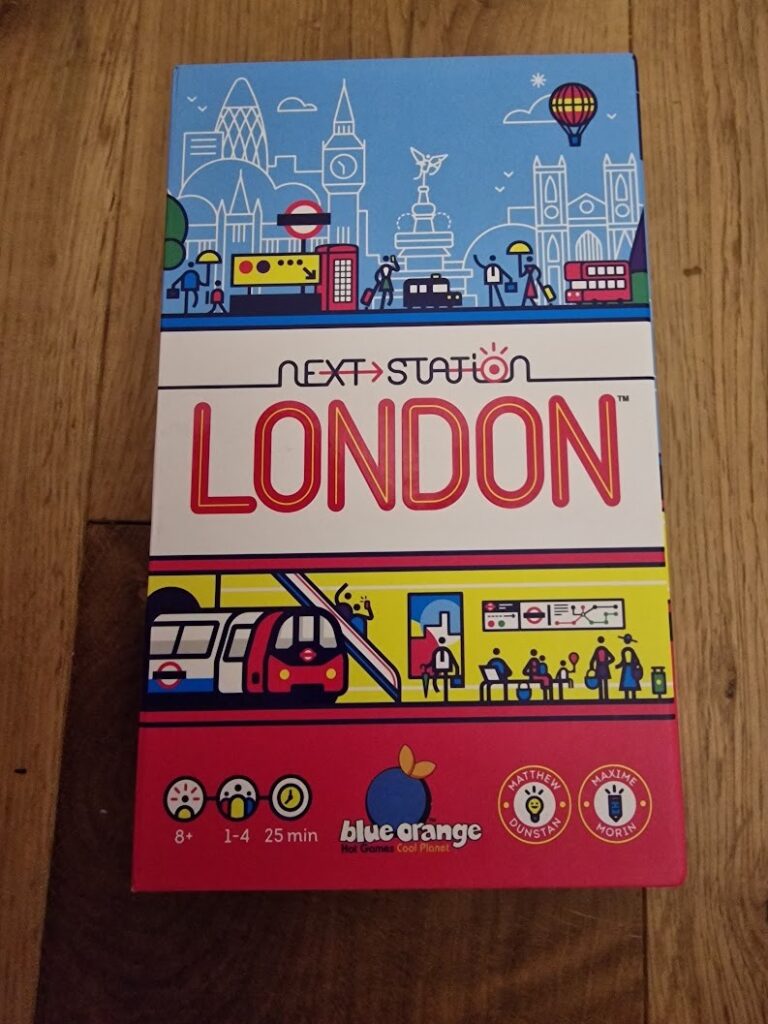 Board game "Next Station: London" by Blue Orange, featuring vibrant illustrations of London's landmarks and transportation, suitable for 1-4 players aged 8 and up, with an average playtime of 25 minutes.