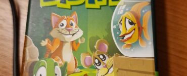 Colorful board game box for "Who Did It?" featuring cartoon animals, designed for 3-6 players aged 6 and up, published by Blue Orange Games. The game promotes deduction and observation skills in a fun, engaging way, perfect for family game nights.