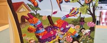 Colorful board game box for "Pinata Party" by Hegedús Csaba, featuring a vibrant piñata and children playing. The design highlights fun candy graphics, game details, and player information, suitable for 2-4 players aged 8 and up.