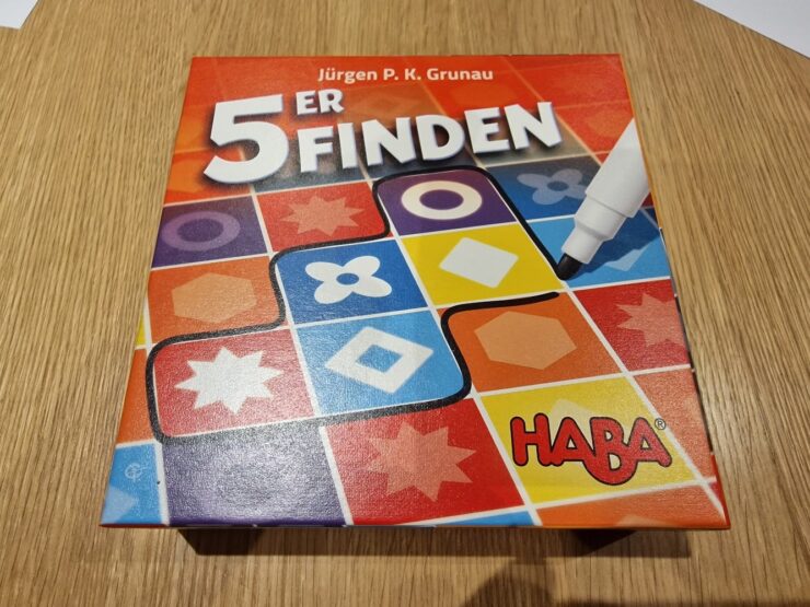 Colorful board game box for "5er Finden" by Jürgen P. K. Grunau, featuring various shapes and vibrant colors, designed for engaging gameplay. HABA branding visible in the corner.