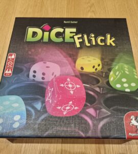 Board game Dice Flick by Rami Gaber, featuring colorful dice on the box cover, suitable for 2-4 players aged 8 and up, with a playtime of 15-25 minutes.
