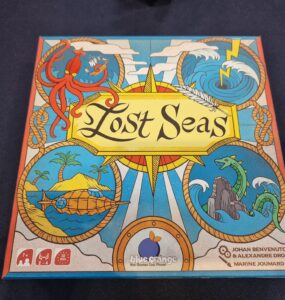 Colorful board game box for "Lost Seas" featuring an octopus, mythical sea creatures, and a nautical design. The game is suitable for 2-4 players, ages 7 and up, with a playtime of approximately 20 minutes. Published by Blue Orange Games, designed by Johan Benvenuto and Alexandre Droit, with artwork by Marine Joumard.