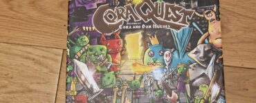 Board game box for "Cora Quest," designed by Cora and Dan Hughes, featuring colorful illustrations of various whimsical creatures and characters. Suitable for 1-4 players, ages 6 and up, with an average playtime of 45 minutes.