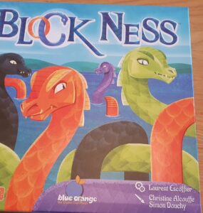Colorful board game "Block Ness" featuring cartoon-style sea monsters, designed for 2-4 players aged 8 and up. The box showcases vibrant illustrations of various mythical creatures against a scenic background, highlighting the game's playful theme.