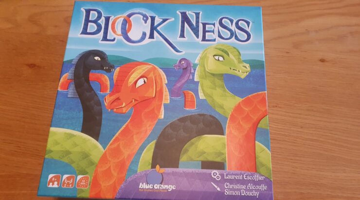 Colorful board game "Block Ness" featuring cartoon-style sea monsters, designed for 2-4 players aged 8 and up. The box showcases vibrant illustrations of various mythical creatures against a scenic background, highlighting the game's playful theme.