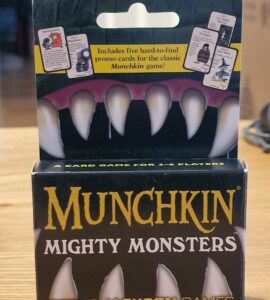 Munchkin Mighty Monsters card game packaging featuring five exclusive promo cards, designed for 3-6 players, by Steve Jackson Games.