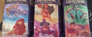 Disney Lorcana trading card game starter decks featuring characters like Simba, Moana, Mickey Mouse, and Cruella de Vil. Each deck is part of "The First Chapter" series, suitable for ages 8 and up.