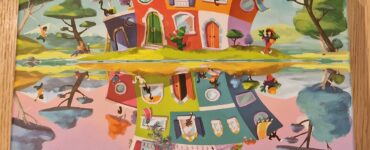 Colorful board game box for "Recto Verso" by Inka Brand, Markus Brand, and Camille Chaussy, featuring whimsical illustrations of a quirky house and playful characters, designed by Tiki Editions.