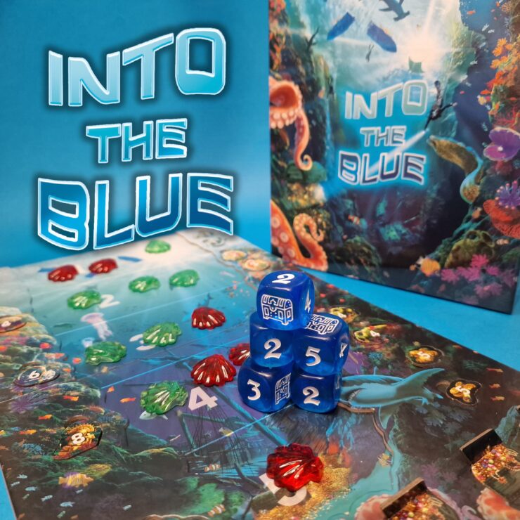 Colorful game setup for "Into the Blue," featuring a vibrant underwater-themed game board, decorative tokens in red and green, and blue dice displaying various numbers. The background highlights the game's title, surrounded by marine life illustrations.