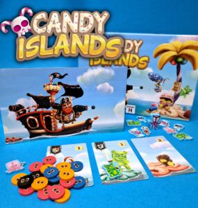 Colorful board game "Candy Islands" featuring a pirate ship, game pieces, and cards. The image displays vibrant tokens, including gummy bear and candy shapes, alongside the game box and promotional art. Ideal for family game night and fun gatherings.