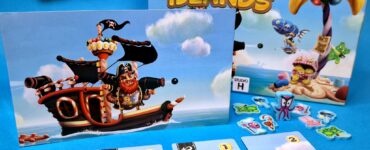 Colorful board game "Candy Islands" featuring a pirate ship, game pieces, and cards. The image displays vibrant tokens, including gummy bear and candy shapes, alongside the game box and promotional art. Ideal for family game night and fun gatherings.