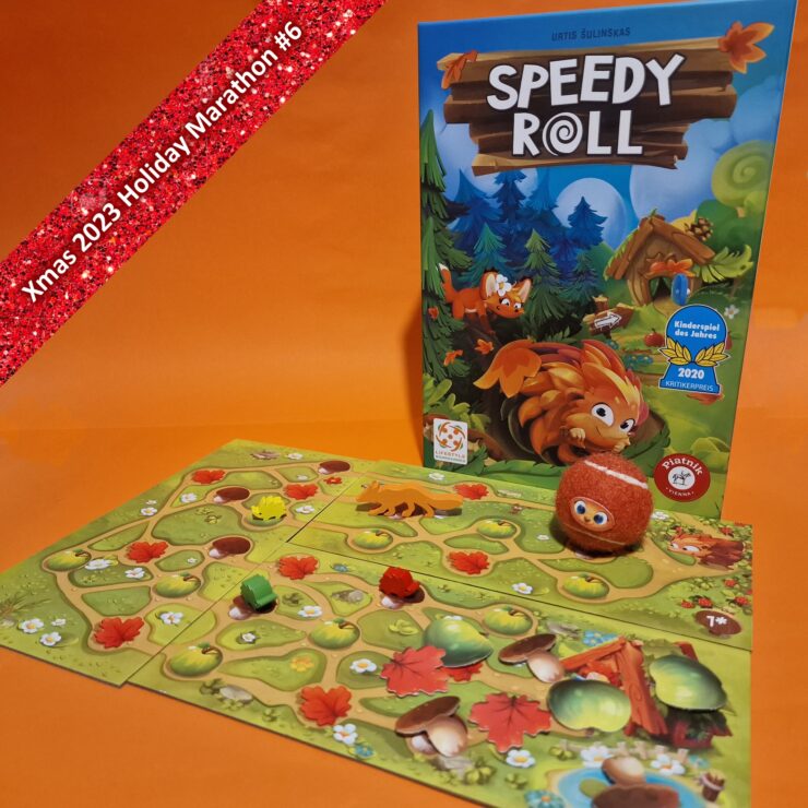 Colorful board game "Speedy Roll" displayed with game pieces and boards on an orange background, featuring playful forest animals and vibrant graphics. Ideal for family game nights, suitable for children aged 7 and up. Part of the Xmas 2023 Holiday Marathon.