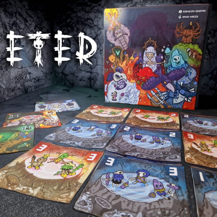 Colorful board game "Eter" with illustrated cards spread out on a textured surface, featuring various characters and vibrant artwork. The game box is prominently displayed in the background, showcasing its creative design. Ideal for tabletop gaming enthusiasts.