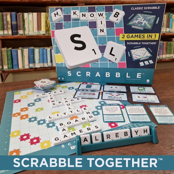 Scrabble Together game box displayed with game pieces and board, featuring colorful tiles, goal cards, and letters, set against a library background. Perfect for family game nights and word enthusiasts.