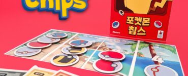Colorful display of Pokémon Chips game featuring Pikachu on the box, with game pieces and character cards laid out on a vibrant pink background. Ideal for Pokémon fans and collectors, showcasing interactive gameplay elements.