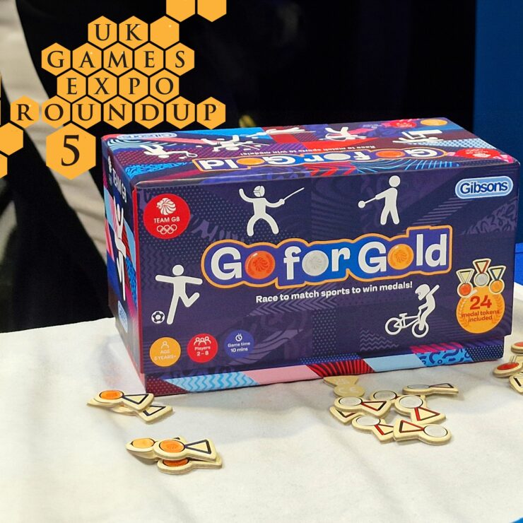 Go for Gold board game by Gibsons displayed at UK Games Expo, featuring colorful box art and sports-themed medal tokens. Suitable for ages 5 and up, designed for 2 to 8 players with a quick game time of 10 minutes.