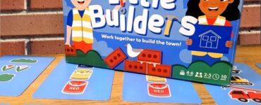 Colorful game box for "Little Builders" featuring two children in construction hats, promoting teamwork in building a town. Surrounding cards display various colorful illustrations, ideal for introducing kids to card games. Summer Marathon 2024 branding is visible in the corner.