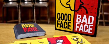Board game "Good Face Bad Face" displayed on a table with colorful cards, suitable for 2-5 players aged 8 and up, featured in a vibrant setting for the Summer Marathon 2024 event.
