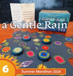 Board game "A Gentle Rain" by Kevin Wilson displayed with game pieces and a promotional card, featuring vibrant floral designs on a puzzle-like game board. The image highlights the game's relaxing theme, suitable for ages 8 and up, and is part of the Summer Marathon 2024 event.