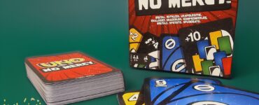 UNO No Mercy card game box and cards displayed on a green background, featuring colorful gameplay elements. Summer Marathon 2024 promotion highlighted in the bottom corner.