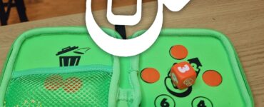 Green game pouch featuring numbered circles and a die, promoting the Summer Marathon 2024 event.