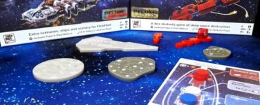 FlickFleet board game expansion display featuring scenarios, ships, and scenery on a cosmic background. The image showcases game components including dice, tokens, and a game board, emphasizing the playful and strategic elements of deep space destruction. Ideal for board game enthusiasts and collectors.