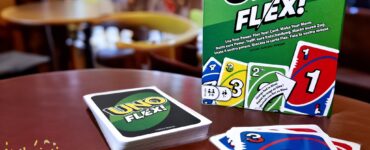 UNO Flex card game displayed on a table with a colorful packaging in a casual setting, featuring a stack of cards and vibrant game elements, promoting fun and interactive gameplay for friends and family. Summer Marathon 2024 event highlighted in the corner.