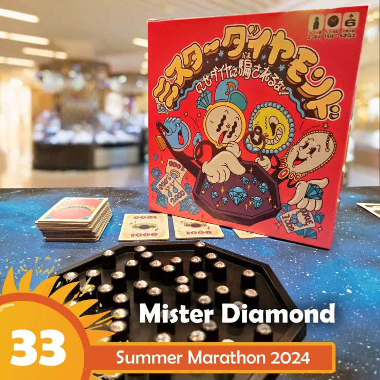 Mister Diamond board game displayed on a colorful table during Summer Marathon 2024, featuring vibrant artwork on the box, game cards, and a hexagonal game board with shiny gems.