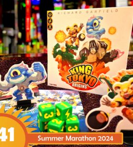 Colorful display of the board game "King of Tokyo: Origins" by Richard Garfield, featuring game pieces, dice, and character standees. The image highlights the vibrant artwork and components of the game, set against a blurred background. Text overlay reads "41 Summer Marathon 2024."