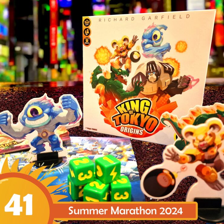 Colorful display of the board game "King of Tokyo: Origins" by Richard Garfield, featuring game pieces, dice, and character standees. The image highlights the vibrant artwork and components of the game, set against a blurred background. Text overlay reads "41 Summer Marathon 2024."