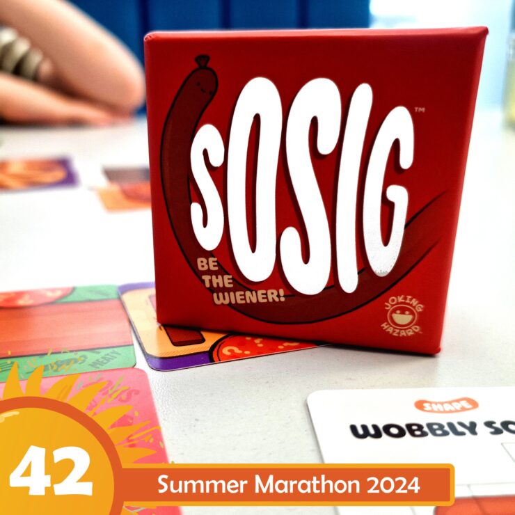 Red box of the game "sOSIG" featuring the tagline "Be the Wiener!" on a table with colorful game cards, hinting at a fun and interactive gaming experience for the Summer Marathon 2024.