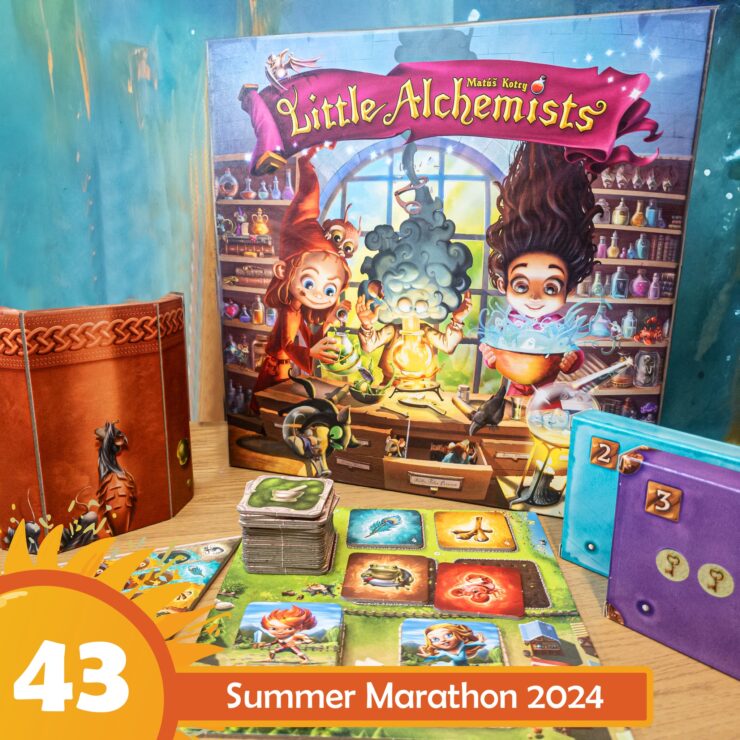 Colorful board game "Little Alchemists" displayed on a wooden table, featuring vibrant artwork of characters engaging in potion-making. The game box, cards, and tokens are arranged alongside a themed background, promoting the Summer Marathon 2024 event.