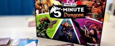 Image of the board game "5-Minute Dungeon" by Connor Reid, featuring vibrant artwork of characters and a colorful box design. The game is displayed alongside various game cards on a table, promoting cooperative and real-time gameplay. The image also includes a badge for "Summer Marathon 2024."