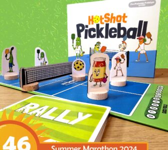 Colorful board game setup for "HotShot Pickleball," featuring playful character pieces, a net, and a game card labeled "RALLY," set against a vibrant background for the Summer Marathon 2024.