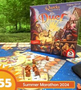 Image of the board game "The Quacks of Quedlinburg: The Duel" by Wolfgang Warsch, featuring vibrant artwork on the box and a game setup for two players. The scene includes game pieces and a colorful game board, set against a natural green background, with a label indicating "55 Summer Marathon 2024."