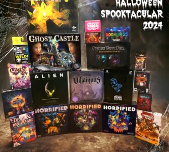 A collection of Halloween-themed board games for 2024, featuring titles like "Ghost Castle," "Alien: Fate of the Nostromo," "Villainous," and "Horrified." The image showcases a vibrant display with game boxes set against a spooky backdrop, perfect for Halloween enthusiasts and board game lovers.