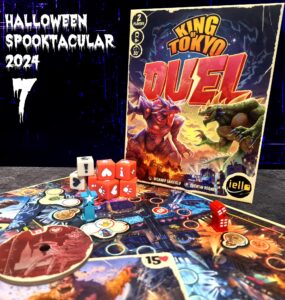 Image of the board game "King of Tokyo Duel," featuring the game box, colorful dice, and game pieces on a vibrant game board. The image includes Halloween-themed text for the "Halloween Spooktacular 2024" event. Ideal for promoting 2-player tabletop gaming experiences.