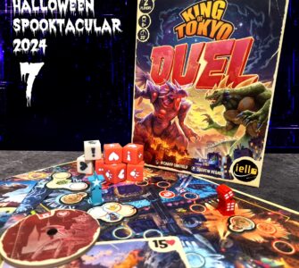 Image of the board game "King of Tokyo Duel," featuring the game box, colorful dice, and game pieces on a vibrant game board. The image includes Halloween-themed text for the "Halloween Spooktacular 2024" event. Ideal for promoting 2-player tabletop gaming experiences.