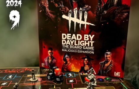 Dead by Daylight: The Board Game - Malicious Expansion displayed for Halloween Spooktacular 2024, featuring game box art and miniatures on the game board with action elements, dice, and character tokens.