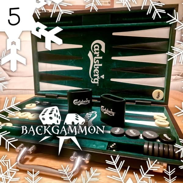 Backgammon game set featuring a green Carlsberg-themed board, dice, and game pieces, with decorative snowflakes in the background. Perfect for holiday gatherings and game nights.