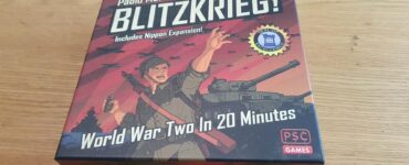 Board game box for "Blitzkrieg!" by Paolo Mori, featuring artwork of a soldier and a tank, highlighting its theme of World War II strategy gameplay in 20 minutes, with the Nippon expansion included.